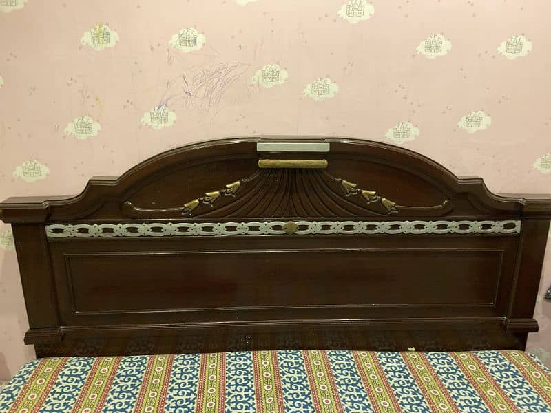 wooden double bed 0