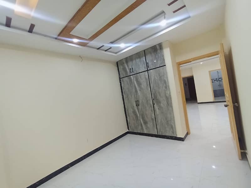 i-8. markaz commcial apartment available for rent main Double road location tiles flooring 16