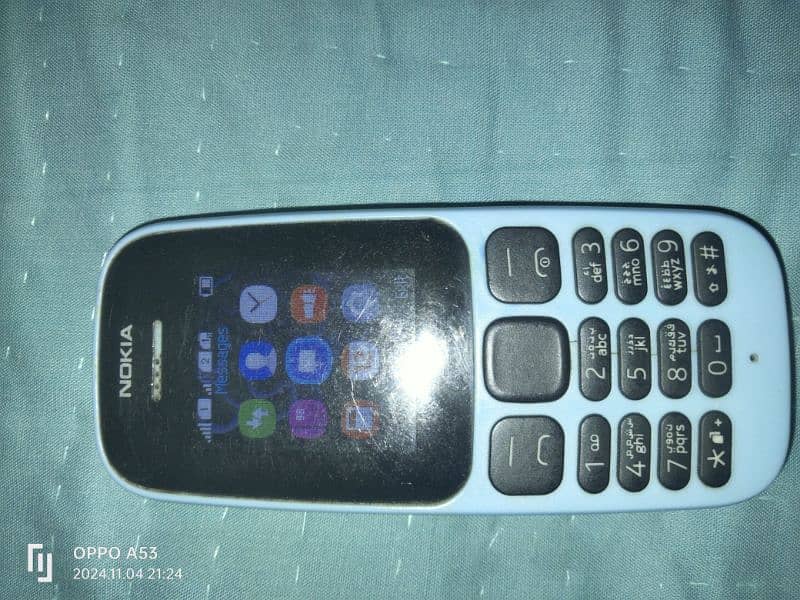 Nokia 105 Mob one hand used 1