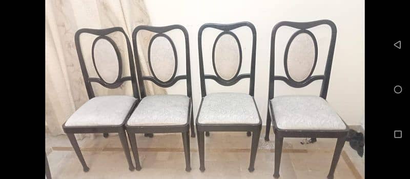 black heavy wooden dining table 6 chairs good condition urgent sale 4