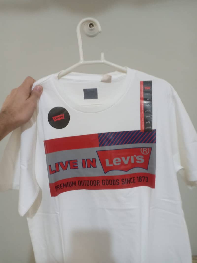 Levi's & polo shirts available in good price . 12