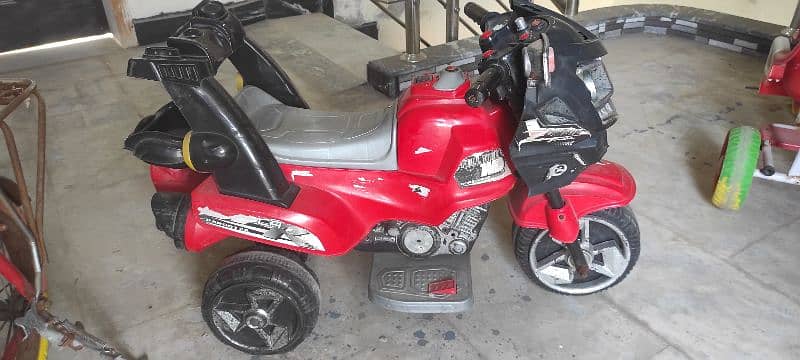 Kids Car and Bike in excellent condition (Battery needs to be replaced 4