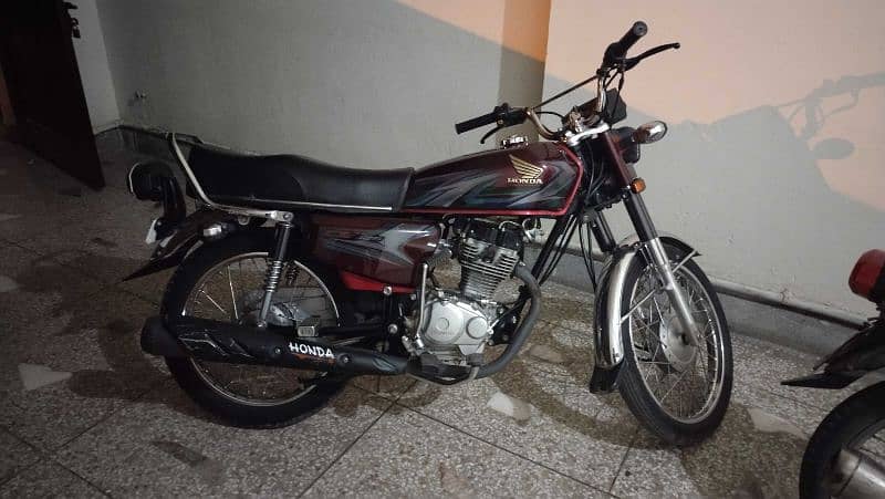 Honda 125  2022 Model 2023 stickers and 2023 registration. 0