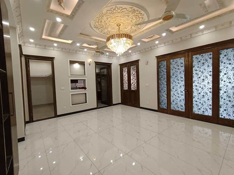 11 Marla House for Sale in PIA HOUSING SOCIETY Very Beautiful Luxury Brand New Spanish House For SALE Near Wapda Town Gol Chakar, Very Super Hot Location Easy Access Through Main Boulevard Road 5