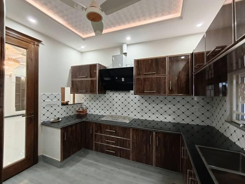 11 Marla House for Sale in PIA HOUSING SOCIETY Very Beautiful Luxury Brand New Spanish House For SALE Near Wapda Town Gol Chakar, Very Super Hot Location Easy Access Through Main Boulevard Road 9