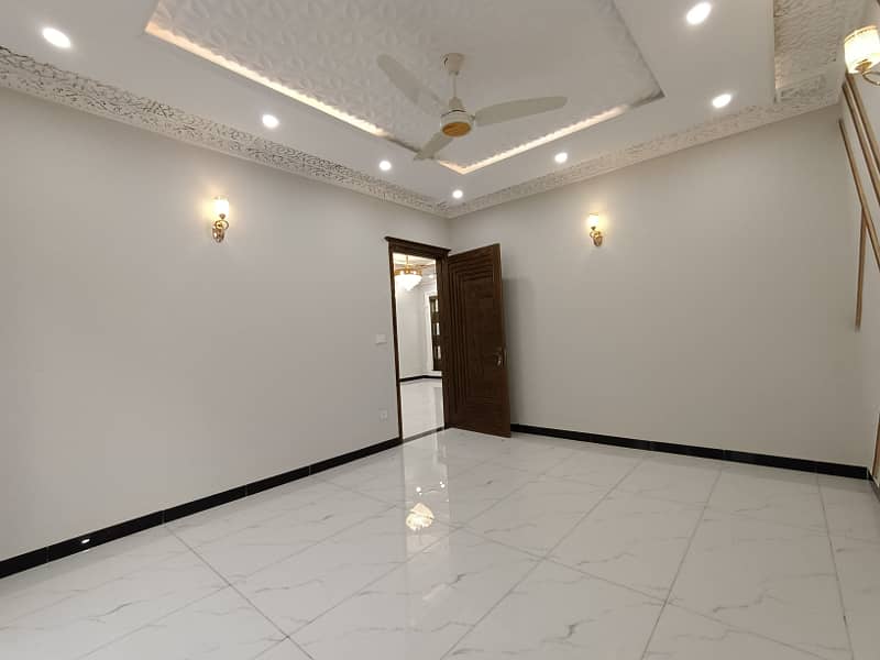 11 Marla House for Sale in PIA HOUSING SOCIETY Very Beautiful Luxury Brand New Spanish House For SALE Near Wapda Town Gol Chakar, Very Super Hot Location Easy Access Through Main Boulevard Road 31