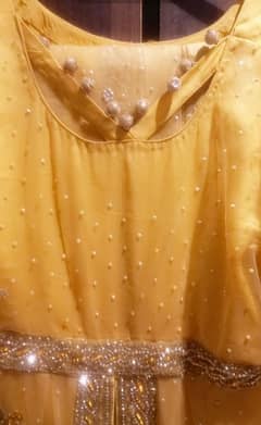 Yellow n Gold Mukash work on Net shirt Very Beautifull