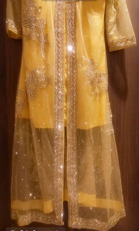 Yellow n Gold Mukash work on Net shirt Very Beautifull 1