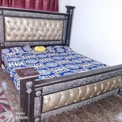 Bed with dressing table and side tables