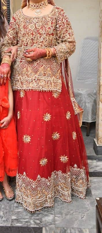 Bridal lehenga choli with poch fully TILA And stone work 3