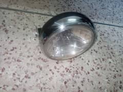 Honda CD 100 2009 model head light urgant sale.