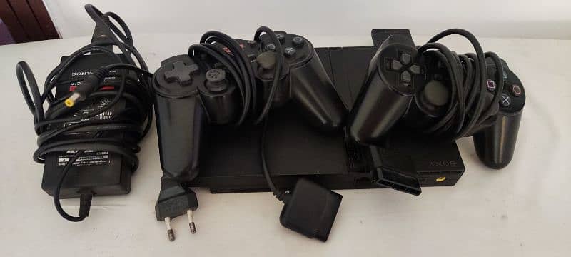 Playstation 2 with 2 wireless controller and accessories 0