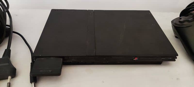 Playstation 2 with 2 wireless controller and accessories 1