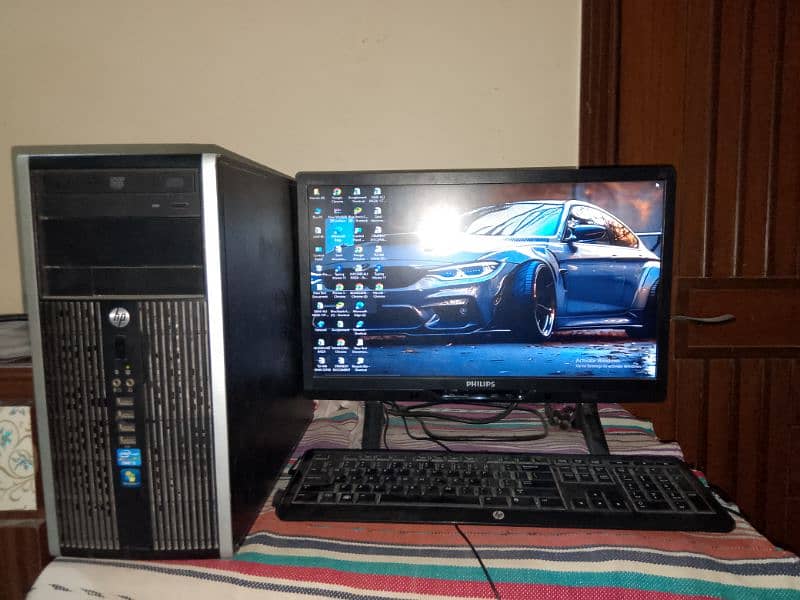 HP CPU (tower type) and Philips monitor. 6