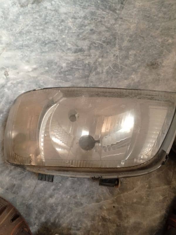 alto 1000 head lights 0