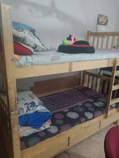 wooden bunk bed for sale  with mattresses.