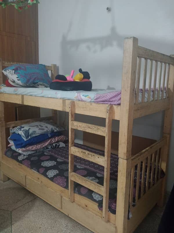 wooden bunk bed for sale  with mattresses. 1