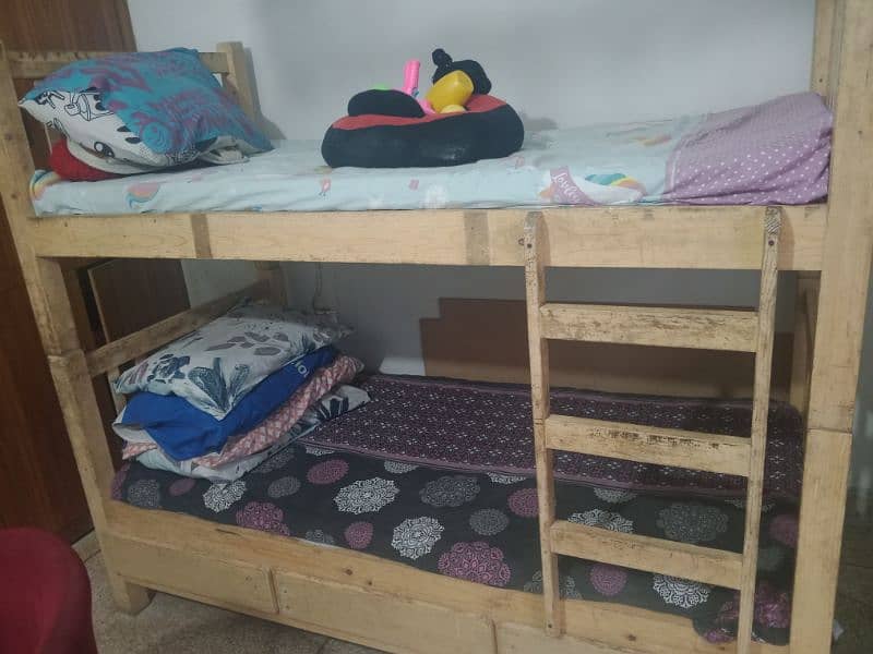 wooden bunk bed for sale  with mattresses. 2