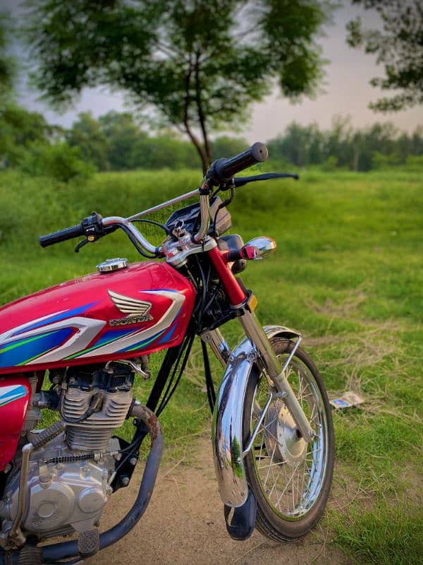 Honda 125 2022 model Punjab number ha smart card ha mara name par 5