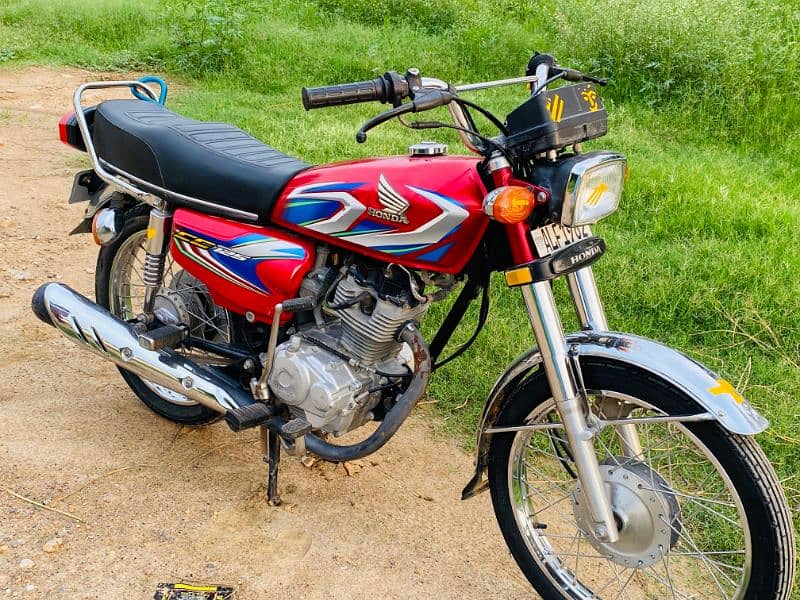 Honda 125 2022 model Punjab number ha smart card ha mara name par 7