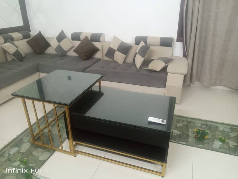 L Shaped Sofa with Nest Center Table 0