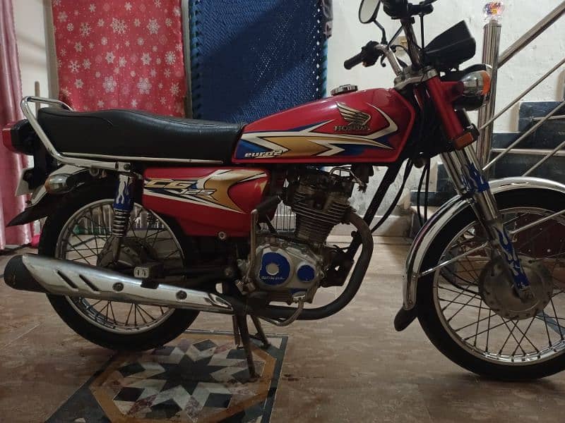 Honda 125 Bike for sale red color good condition 1