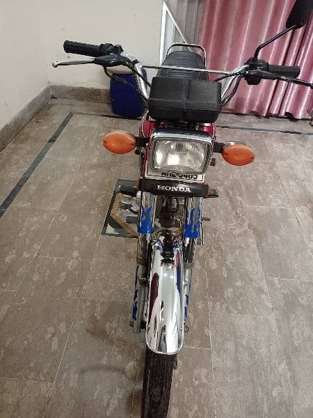 Honda 125 Bike for sale red color good condition 2