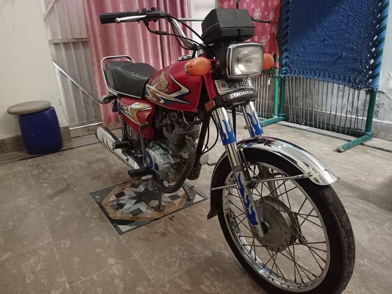 Honda 125 Bike for sale red color good condition 8