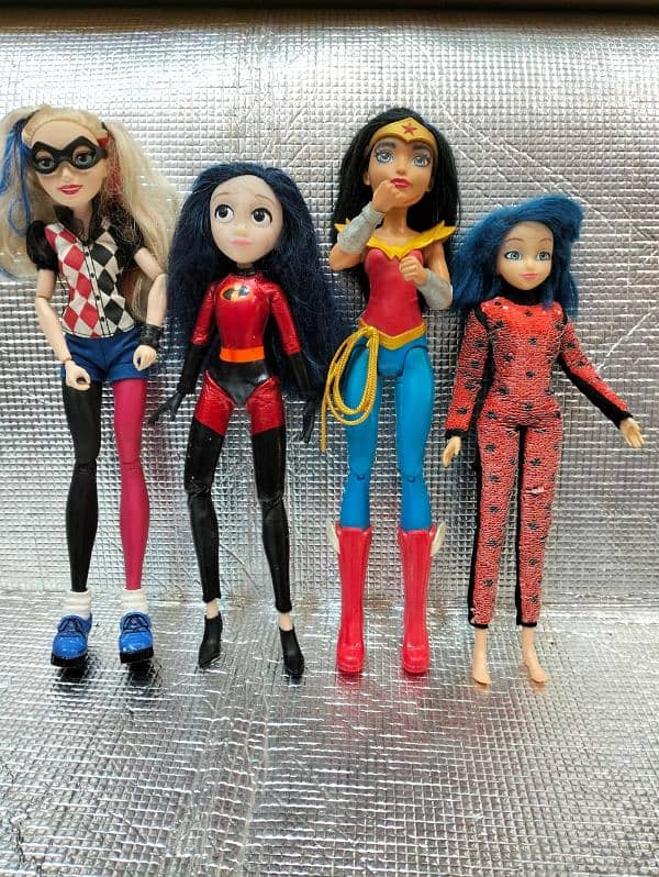 dolls disney or orignal Barbies 4