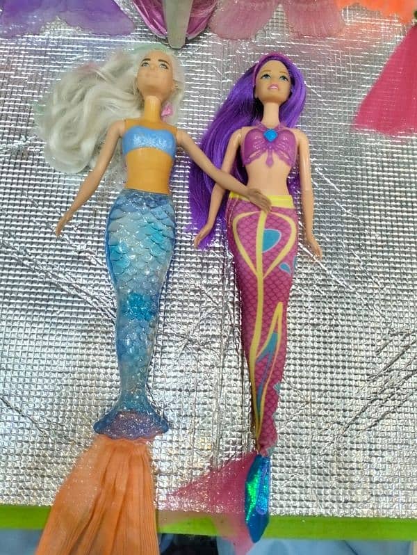 dolls disney or orignal Barbies 10