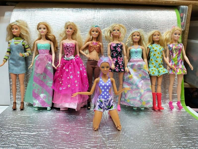 dolls disney or orignal Barbies 18