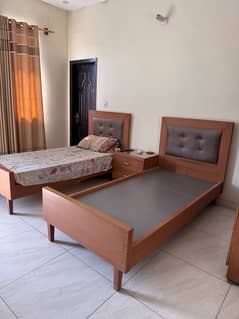 single bed set with center table and 2 door cupboard