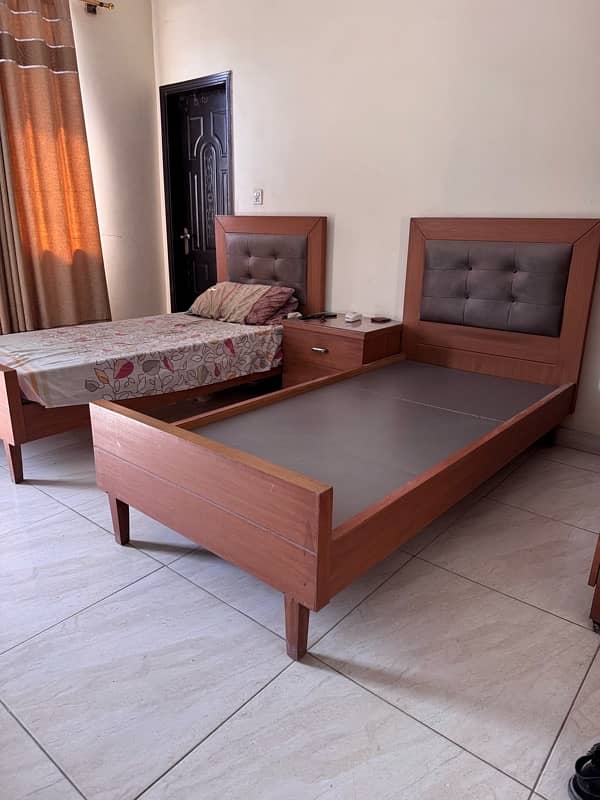 single bed set with center table and 2 door cupboard 2