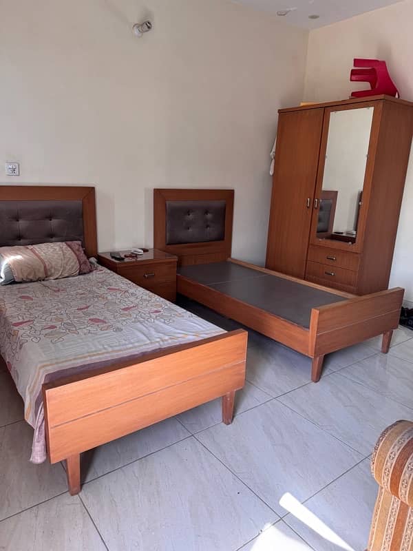 single bed set with center table and 2 door cupboard 3