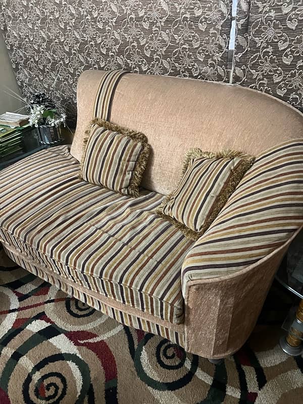 7 seater sofa set with 6 cushions and a red settee 2