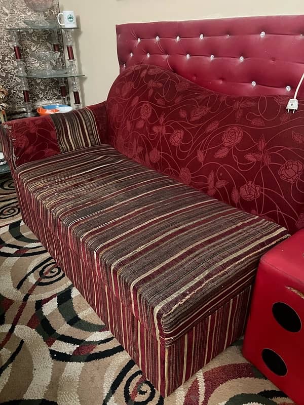 7 seater sofa set with 6 cushions and a red settee 3