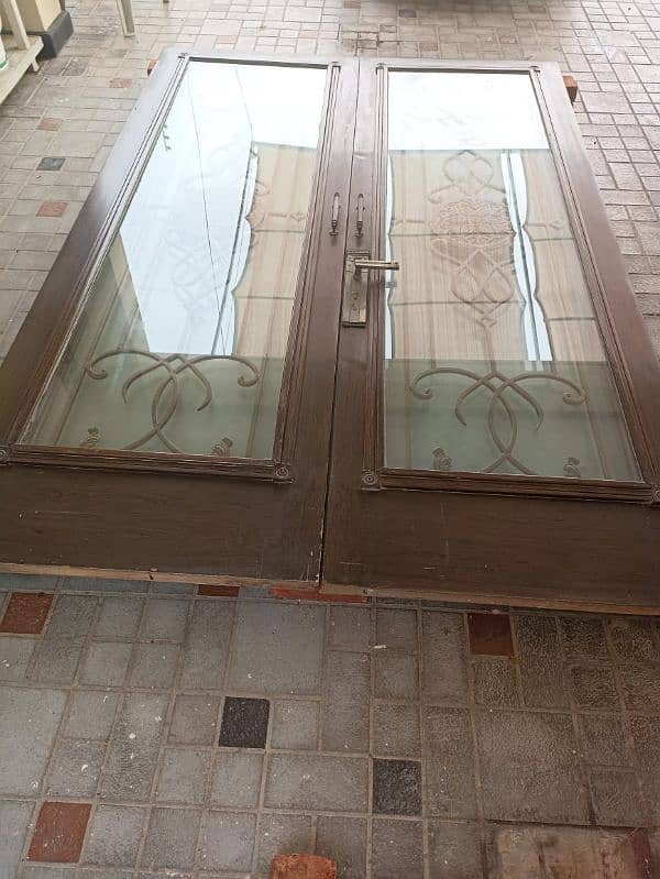 wooden door with glass and grill 1