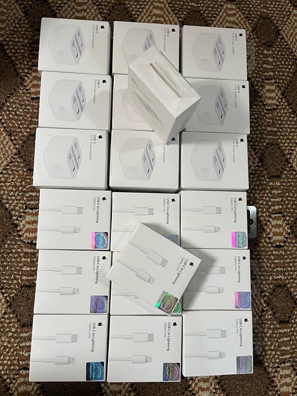 Apple orignal charger with 1 year garrenty 2