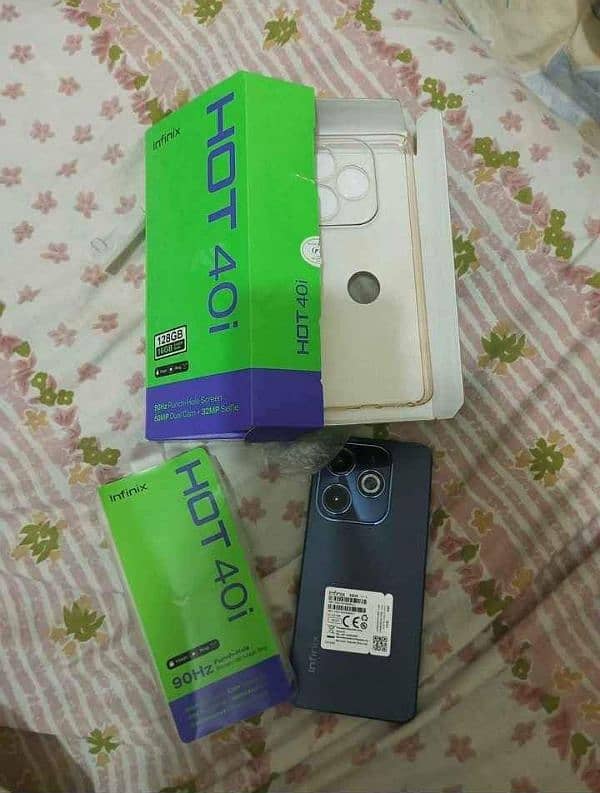 Infinix Hot 40 i Brand New Open Box . with Original Charger 2