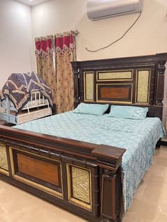 bed set with dressing table in good condition