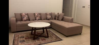 Brown color's corner sofa + 1 round table + 8 cushions