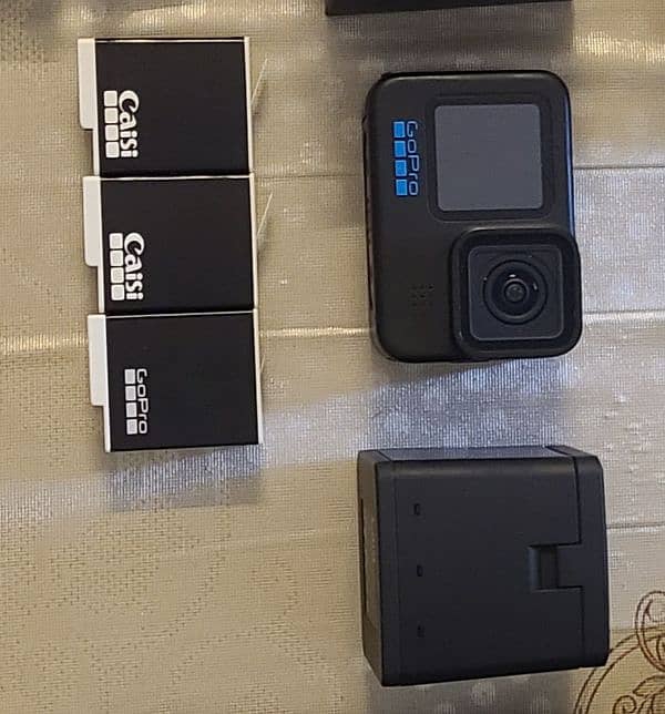 GoPro Hero 10 Black with 3 batteries 10/10 condition 0