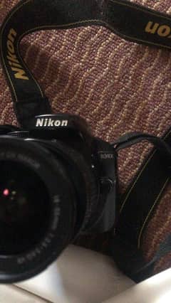 Nikon D3400 10/10 with lens