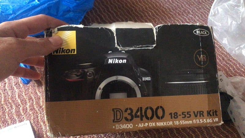 Nikon D3400 10/10 with lens 8