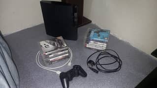 Play Station 3 with 15 games CDs and 2 controllers