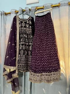 heavy embroiderd velvet shirt with lehnga and net dupatta