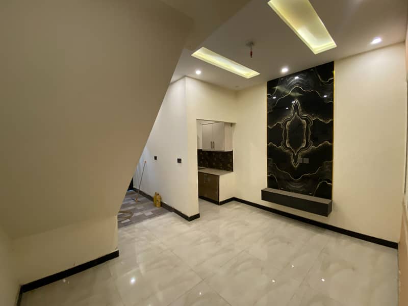 BRAND NEW 2.75 MARLA HOUSE WITH PREMIUM FINISHES - PRIME LOCATION IN GULSHAN E RAVI 11