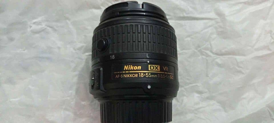 Nikon D5100 with 2 lens 50mm and 18-55mm 9