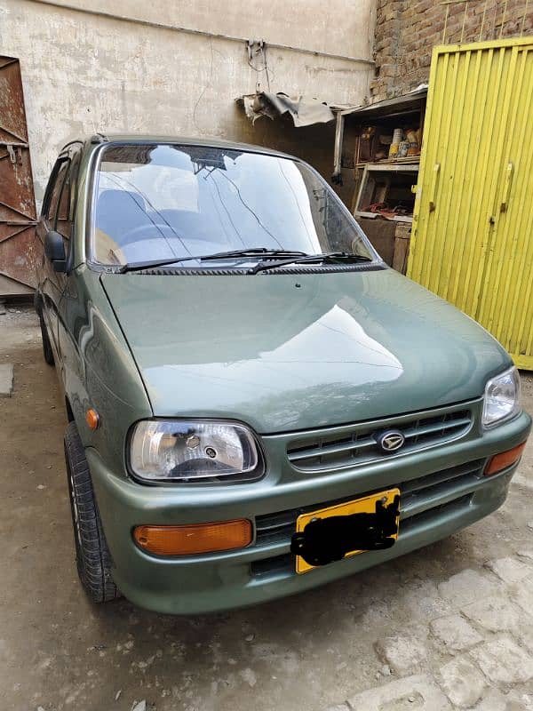 Daihatsu Cuore 2011/2012 1