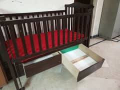 pure wooden baby cot for sale along with it's mattress